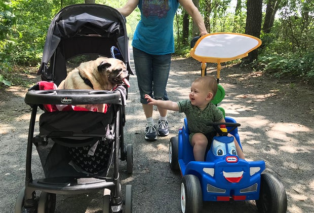 mom, dog in stroller and boy at Belmont Lake State Park