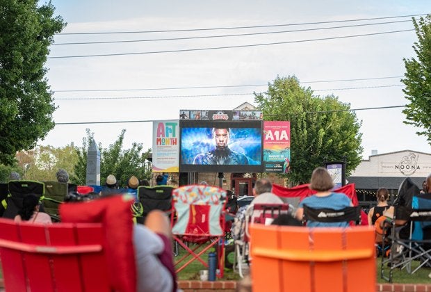 Purchase dinner from local restaurants or pack one from home for Duluth's summer movie series, Flicks on the Bricks. Photo courtesy of the event