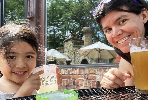 Give a cheers in the garden at Two Brothers. Photo by Maureen Wilkey