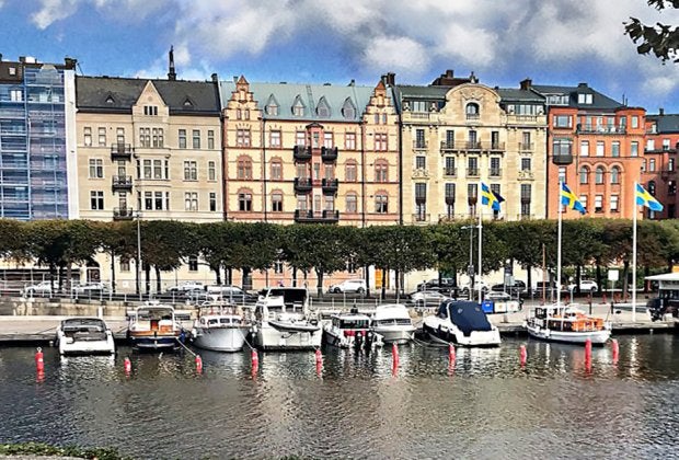 Stroll along the canal in Stockholm's Norrmalm neighborhood.