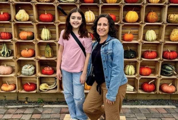 Take a picture in front of the famous pumpkin wall at Nalls Produce! Photo courtesy of the author