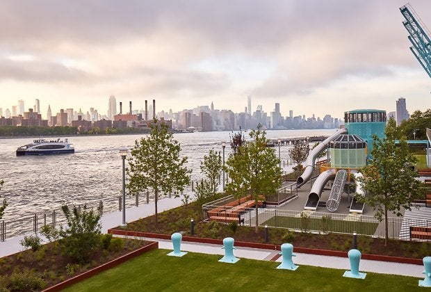 The waterfront park includes green space and playgrounds.
