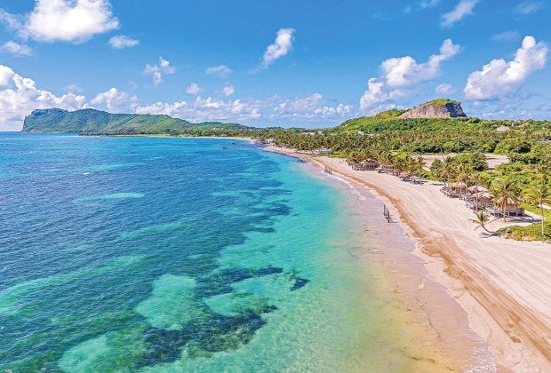 Beach, volcano, chocolate, water sports, hiking, horseback, amazing food, incredible people... why St. Lucia should be your next family vacation. Photo courtesy of Coconut Bay Beach Resort & Spa