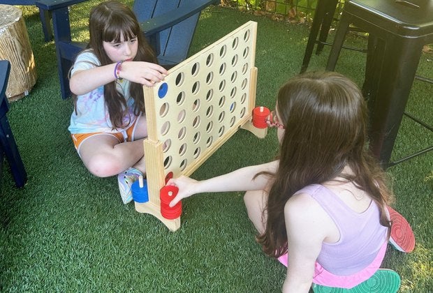 Choose laid-back Atlanta restaurants that offer low-cost menu items AND fun for kids! Photo by Melanie Preis