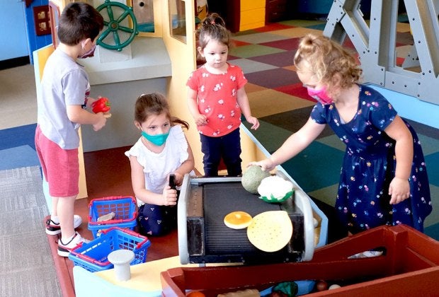 A collaborative effort takes place in LICM's TotSpot. Photo courtesy of the museum