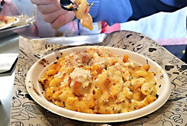 Dig into a hearty bowl of  the signature dish at I Heart Mac and Cheese.