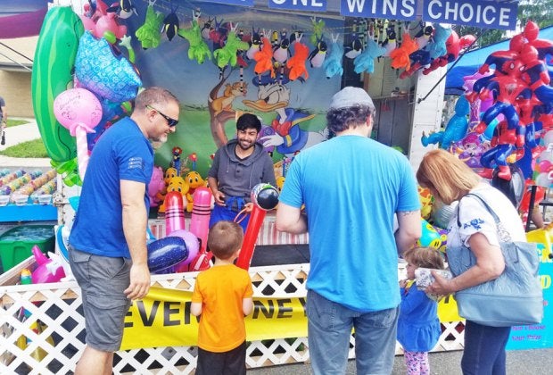 The Ridgefield Park Music Fest Street Fair has lots to see and do, including music, food, games, and rides. Photo courtesy of  JC Promotions