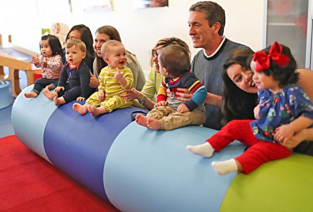 Gymboree offers movement classes for babies and toddlers with caregivers. Photo courtesy of Gymboree