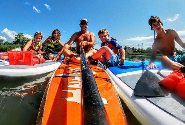 Oceanport Paddle Club invites visitors and "Positive Vibes Only," to experience its fun. Photo courtesy of the club