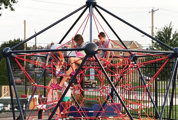 Kids can do the spider climb and so much more at the Memorial Park Playground. 