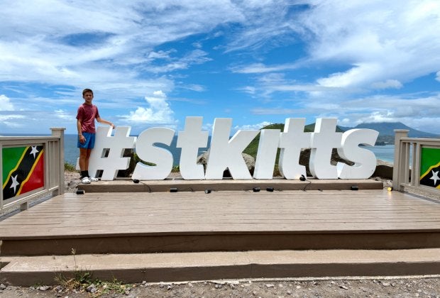 Your family and followers will know exactly where you're vacationing when you send them a pic at the St. Kitts sign at the Timothy Hill Overlook.