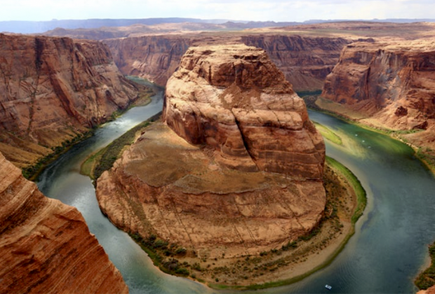 Take in the jaw-dropping geological views from Horseshoe Bend in Glen Canyon National Recreation Area. Photo courtesy of Canva