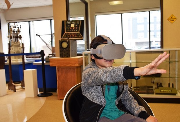 Virtual-reality goggles transport kids to another world. 
