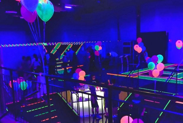 Throw a birthday party with glow-in-the-dark trampoline time at Bounce! in  Valley Cottage. Photo courtesy of the venue