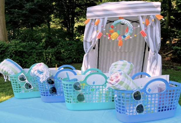 Summer goody bags that have a towel and sunglasses will get used for years!