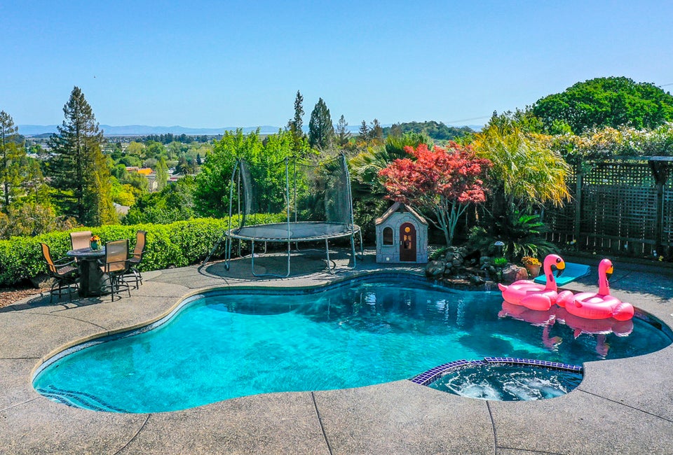 Rent a gorgeous backyard pool like this for your family for an hour or a day. Photo courtesy of Swimply