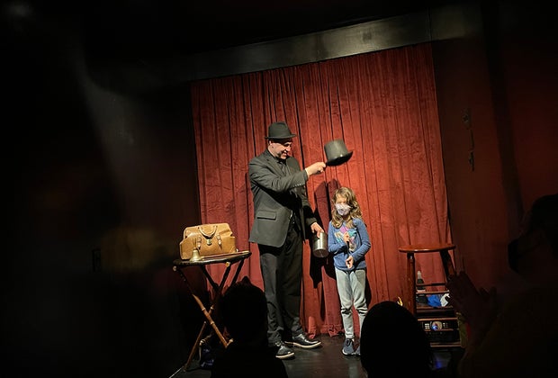 The Brooklyn Magic Shop invites kids on stage during Apolino's magic show