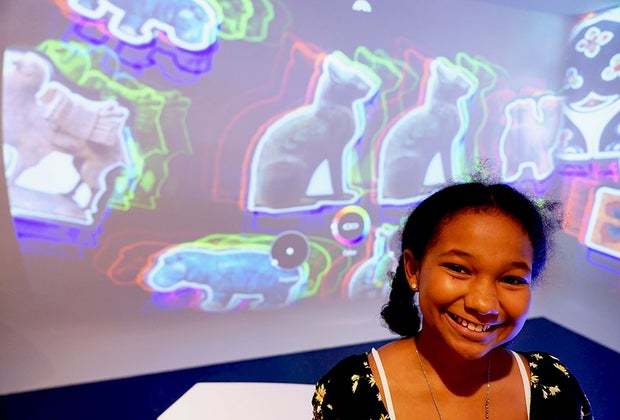 The Met's 81st Street Studio: Girl in front of projection screen
