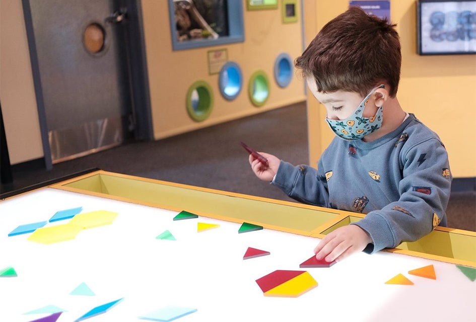 The tanagram exhibit at the Long Island Children's Museum helps little learners engage in spatial learning. Photo courtesy of the museum