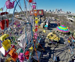 Enjoy exciting rides and your favorite carnival cuisine at the Atlanta Fair. Photo courtesy of the fair