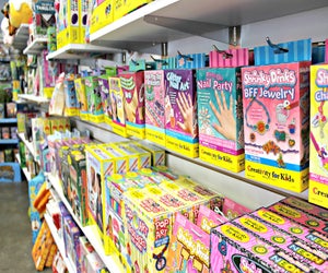 Customers shop the store through FaceTime in lieu of visiting in person. Photo courtesy of Tomfoolery Toys & Books 