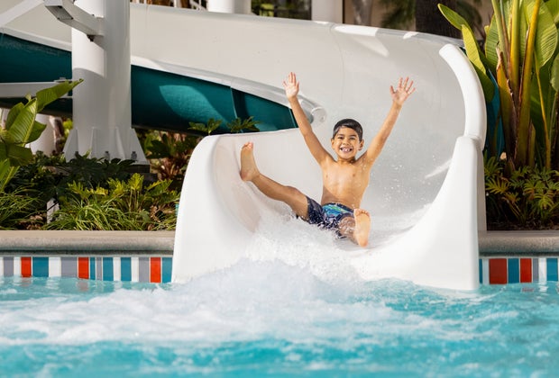 Boy slides down the Twister at Town and Country Resort.