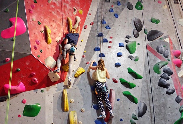 Best Things To Do in St. Petersburg, Florida: Vertical Ventures two girls indoor rock climbing