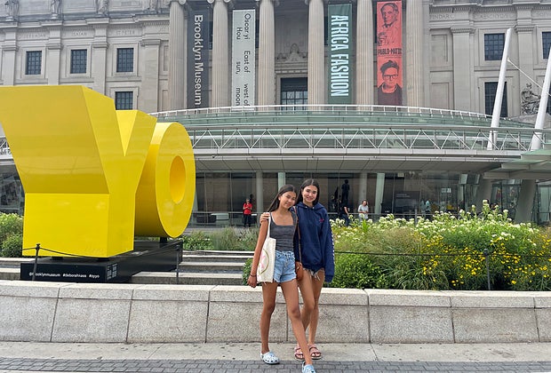 Things to do in Crown Heights, Brooklyn: Two girls in front of the Brooklyn Museum