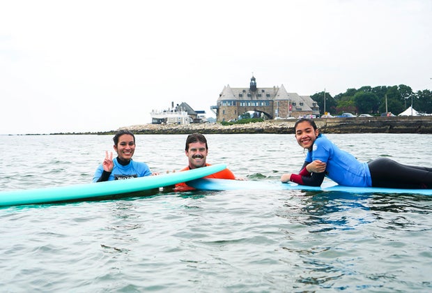 Image of surfers in the water - Things to do in Narragansett.