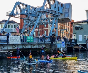 Halloween takes to the sea in Mystic! Annual  Witch Paddle and Coat Drive photo courtesy of the Adventure Mystic Facebook page
