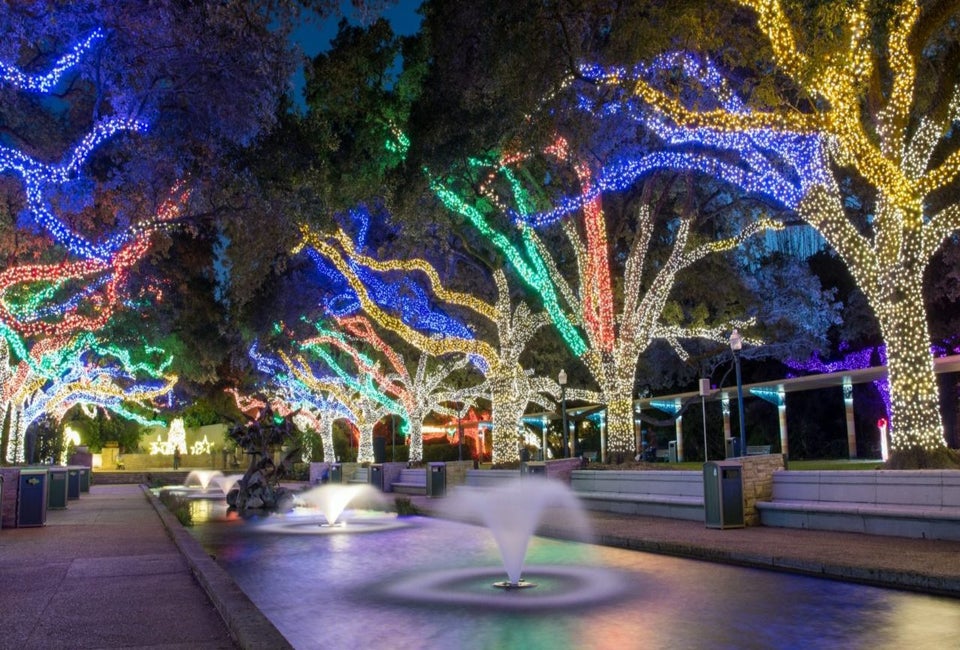 The promenade at the Houston Zoo is brilliantly lit during the holidays at Zoo Lights.