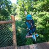 Test your comfort zone on the zip line at the Bronx Zoo's Treetop Adventure.
