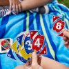 You don't have to worry about UNO Splash cards getting wet! Photo courtesy of Mattel Games, via the UNO Amazon Store.