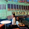 Pose for a post-card worthy photo in front of the Hershey-themed mural at Tru by Hilton Hershey Chocolate Avenue during your stay. 