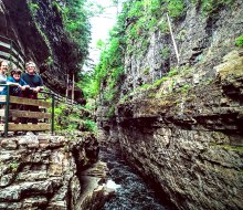 The Ausable Chasm has been described as the Grand Canyon of the Adirondacks and it's one of our top 100 things to do in New York State with kids. Photo by Anna Fader