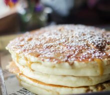 Tempt yourself with the banana crumb pancakes at The Flour Shoppe Cafe.