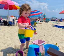 A pile of buckets goes a long way with young kids at the beach. 