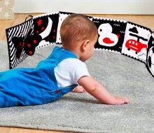 Black-and-white toys and books, like this Thremhoo foldout book, are the perfect first tummy-time playthings. 