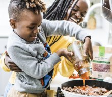 One top tip is getting kids involved from the planning stage, and they'll want to help cook! Photo by Brooke Lark, via Pexels