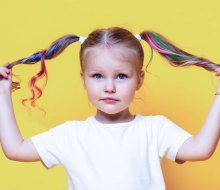 Punch up pigtails with some colorful hair chalk for kids. Photo courtesy of Magicat Premium Hair Chalk