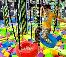 Fun Max Adventure Park's features include slides, a ball pit, and an obstacle course.