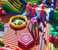 Fun is springing up all over Connecticut with amazing things to do with kids in July 2024! FUNBOX Inflatable Playground in Enfield photo courtesy of FUNBOX