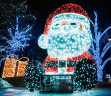 Santa Claus is beaming with excitement for the best holiday lights drive-thrus and Christmas light shows in Connecticut! Photo courtesy of Holiday Stroll at Mill River Park