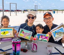 A beach side festival is perfect for Summer. World Ocean Day Festival photo by R. Velasquez for Visit Galveston.