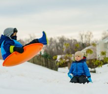 Catch some air on one of the many sledding hills in the Hudson Valley. Photo by Jeremy McKnight on Unsplash.
