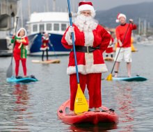 Forget the reindeer, Santa is paddling! Photo courtesy of Ventura Harbor Village