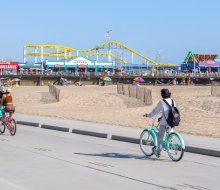 A family bike ride along The Strand is an essential SoCal day. Photo by Meghan Dhaliwal, courtesy of Visit California.