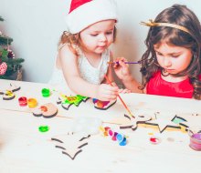 Festive crafts are an essential part of any holiday party for toddlers and preschoolers! Photo courtesy of Canva 