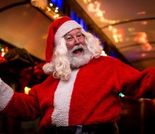 Santa greets families on the daytime Santa Express and the evening Northern Lights Limited Christmas trains. Photo courtesy of the Naugatuck Railroad