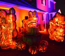 The Great Jack-o'-Lantern Blaze features hand-carved jack-o’-lanterns in elaborate displays at Old Bethpage Village Restoration. Photo by Jaime Sumersille